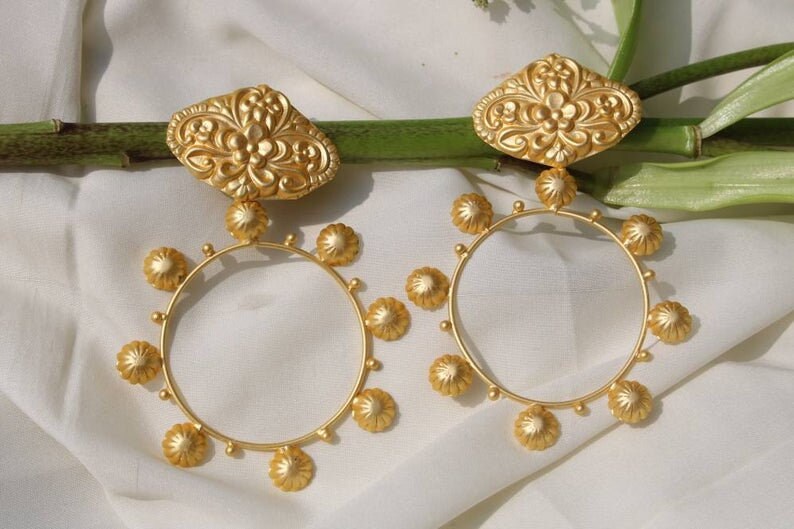 Gold polish earring